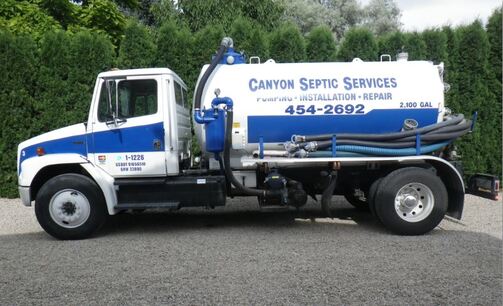 Canyon Septic pump truck on a gravel pull-off — Caldwell, Idaho